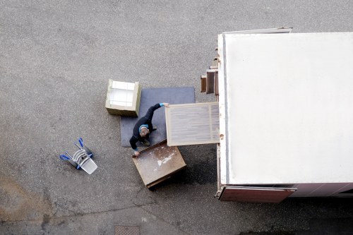 A local packing team organising items for a property move in Malden Rushett