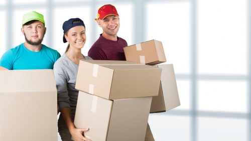 Removal van and moving boxes for a house move in Malden Rushett
