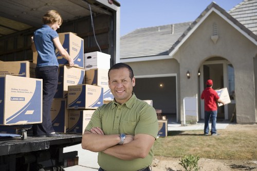 Packed boxes and furniture ready for house removals