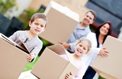 Packing boxes and furniture being prepared for a house move near Malden Rushett