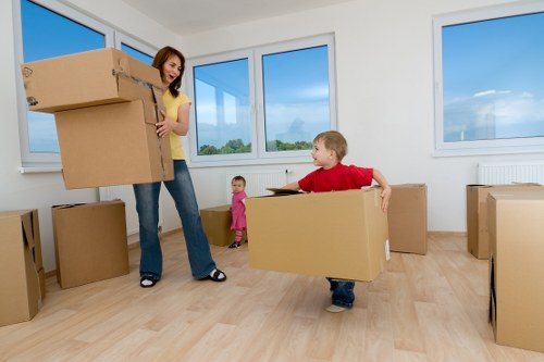 Movers handling furniture and boxes during a Malden Rushett relocation