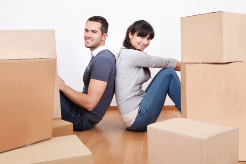 Loading household furniture into a removal van near Malden Rushett