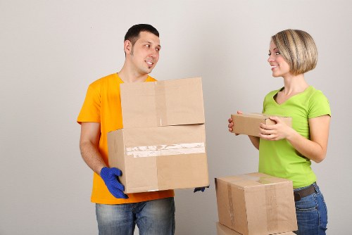 Packed office furniture and equipment ready for relocation in Malden Rushett